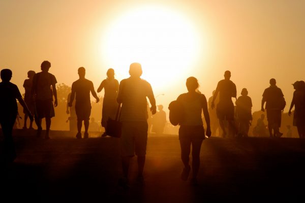People in front of Sun